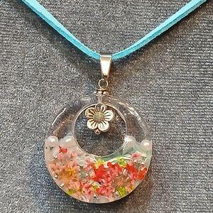 Handmade Clear Resin Floral Pendant Necklace with Blue Cord